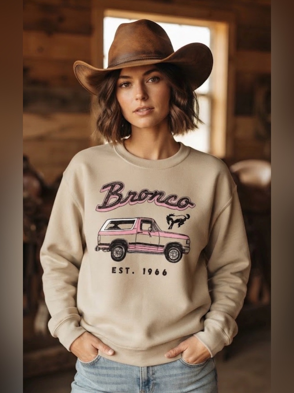 Junk Food Clothing Beige Crewneck with Pink Bronco Graphic Sweatshirt